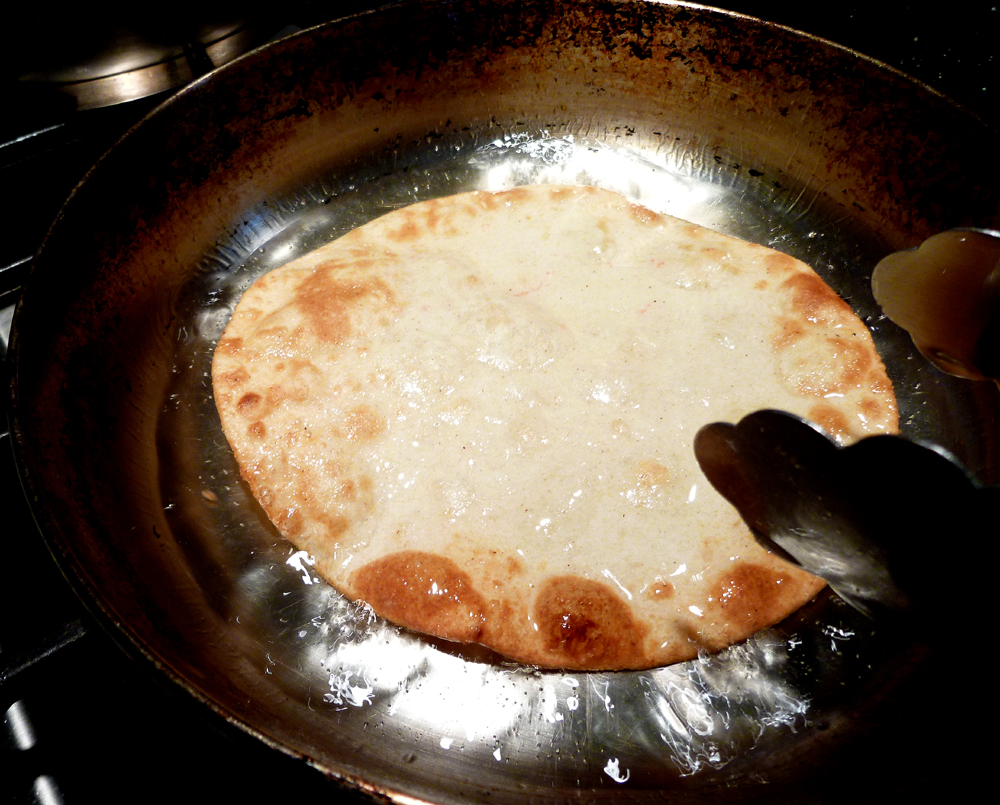 frying tortillas
